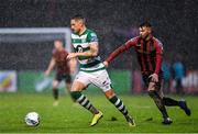 15 February 2020; Lee Grace of Shamrock Rovers in action against Danny Mandroiu of Bohemians during the SSE Airtricity League Premier Division match between Bohemians and Shamrock Rovers at Dalymount Park in Dublin. Photo by Seb Daly/Sportsfile
