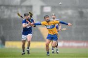 16 February 2020; David Reidy of Clare in action against James Keyes of Laois during the Allianz Hurling League Division 1 Group B Round 3 match between Clare and Laois at Cusack Park in Ennis, Clare. Photo by Eóin Noonan/Sportsfile
