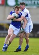 16 February 2020; Bryan Magee of Cavan in action against Seán Byrne of Laois during the Allianz Football League Division 2 Round 3 match between Laois and Cavan at MW Hire O'Moore Park in Portlaoise, Laois. Photo by Piaras Ó Mídheach/Sportsfile