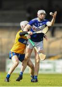 16 February 2020; Ryan Mullaney of Laois is tackled by Liam Corry of Clare during the Allianz Hurling League Division 1 Group B Round 3 match between Clare and Laois at Cusack Park in Ennis, Clare. Photo by Eóin Noonan/Sportsfile