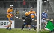 16 February 2020; Eibhear Quilligan of Clare saves a shot on goal by James Keyes of Laois during the Allianz Hurling League Division 1 Group B Round 3 match between Clare and Laois at Cusack Park in Ennis, Clare. Photo by Eóin Noonan/Sportsfile