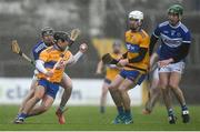 16 February 2020; David Reidy of Clare in action against John Lennon of Laois during the Allianz Hurling League Division 1 Group B Round 3 match between Clare and Laois at Cusack Park in Ennis, Clare. Photo by Eóin Noonan/Sportsfile