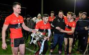 12 February 2020; UCC captains Paddy O'Loughlin, left, and Eoghan Murphy celebrate with the cup after the Fitzgibbon Cup Final match between UCC and IT Carlow at Dublin City University Sportsgrounds in Glasnevin, Dublin. Photo by Piaras Ó Mídheach/Sportsfile