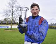 18 February 2020; Jockey Conor McNamara with the trophy after riding Ifyoucatchmenow to victory in the BoyleSports Grand National Trial Handicap Steeplechase at Punchestown Racecourse in Kildare. Photo by Harry Murphy/Sportsfile