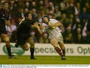 20 December 2003; Neil Doak, Ulster, is tackled by Scott Murry, Edinburgh. Celtic Cup Final, Edinburgh Rugby v Ulster, Murrayfield, Edinburgh, Scotland. Picture credit; Matt Browne / SPORTSFILE *EDI*