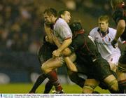 20 December 2003; Roger Wilson, Ulster, is tackled by  Simon Taylor and Chris Paterson, Edinburgh. Celtic Cup Final, Edinburgh Rugby v Ulster, Murrayfield, Edinburgh, Scotland. Picture credit; Matt Browne / SPORTSFILE *EDI*
