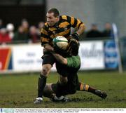 20 December 2003; Thomas Bonnefoy, Co. Carlow, in action against De La Salle Palmerston's Brian Hogan. Leinster Senior Cup Final, Co. Carlow v De La Salle Palmerston, Donnybrook, Dublin. Picture credit; Pat Murphy  / SPORTSFILE *EDI*