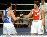 19 December 2003; Alan Reynolds, red, after winning his fight, shakes hands with Michael McDonagh, Blue, at the end of the fight. National Senior Championships 2004, Heavyweight Final, Alan Reynolds, (St. Josephs, Sligo) v Michael McDonagh, (Brosna), National Stadium, Dublin. Picture credit; Damien Eagers / SPORTSFILE *EDI*
