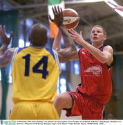 21 December 2003; Marc Michiels, UCC Demons, in action against Cedric Peoples, UCD Marian. ESB Men's Superleague, Mardyke UCC Demons v Hibernian UCD Marian, Mardyke Arena, Cork. Picture Credit; Brendan Moran / SPORTSFILE *EDI*