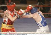 19 December 2003; Paul Hyland, Golden Cobra, in action against Thomas Lee, Oughterard. National Senior Championships 2004, Flyweight Final, Paul Hyland, (Golden Cobra) v Thomas Lee, (Oughterard), National Stadium, Dublin. Picture credit; Damien Eagers / SPORTSFILE *EDI*