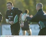 29 December 2003; Ireland's Rob Henderson passes to Peter Stringer during squad training. Irish Rugby squad training, Naas Rugby Club, Naas, Co. Kildare. Picture credit; David Maher / SPORTSFILE *EDI*