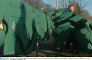 29 December 2003; Ireland's Eddie O'Sullivan carries body protection suits during squad training. Irish Rugby squad training, Naas Rugby Club, Naas, Co. Kildare. Picture credit; David Maher / SPORTSFILE *EDI*