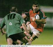 2 January 2004; Jim Williams, Munster, in action against Michael Swift and Eric Elwood, Connacht. Celtic League, Connacht v Munster. Dubarry Park, Athlone.  Picture credit; David Maher / SPORTSFILE *EDI*