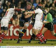 2 January 2004; Victor Costello, Leinster, is tackled by Tyrone Howe, 11 and Neil Doak, 9, Ulster. Celtic League, Leinster v Ulster, Donnybrook, Dublin.  Picture credit; Matt Browne / SPORTSFILE *EDI*