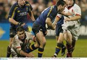2 January 2004; Felipe Contebomi, Leinster, is tackled by Andy Ward and Neil Doak, Ulster. Celtic League, Leinster v Ulster, Donnybrook, Dublin.  Picture credit; Matt Browne / SPORTSFILE *EDI*