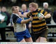 3 January 2004; Andy Melville, Co. Carlow, is tackled by Ultan O'Callaghan, Cork Constitution. AIB All Ireland League 2003-2004, Division 1, Co. Carlow v Cork Constitution, Oak Park, Co. Carlow. Picture credit; Matt Browne / SPORTSFILE *EDI*