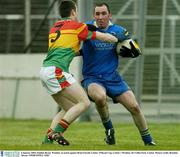 4 January 2004; Stephen Byrne, Wicklow, in action against Brian Farrell, Carlow. O'Byrne Cup, Carlow v Wicklow, Dr Cullen Park, Carlow. Picture credit; Brendan Moran / SPORTSFILE *EDI*