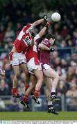 4 January 2004; David O'Shaughnessy, Westmeath, in action against Louth players David Devenney and Graham Carr. O'Byrne Cup, Westmeath v Louth, Cusack Park, Mullingar, Co. Westmeath. Picture credit; Ray McManus / SPORTSFILE *EDI*