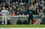 4 January 2004; Managers Paidi î SŽ, Westmeath, left, and Val Andrews, Louth, watch the game from the sideline. O'Byrne Cup, Westmeath v Louth, Cusack Park, Mullingar, Co. Westmeath. Picture credit; Ray McManus / SPORTSFILE *EDI*