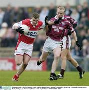 4 January 2004; Colin McGuinness, Louth, in action against Aidan Canning, Westmeath. O'Byrne Cup, Westmeath v Louth, Cusack Park, Mullingar, Co. Westmeath. Picture credit; Ray McManus / SPORTSFILE *EDI*