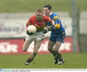 4 January 2004; Brian Kelly, Carlow, in action against Niall Butler, Wicklow. O'Byrne Cup, Carlow v Wicklow, Dr Cullen Park, Carlow. Picture credit; Brendan Moran / SPORTSFILE *EDI*