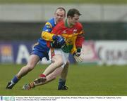 4 January 2004; Mark Carpenter, Carlow, in action against Adrian Foley, Wicklow. O'Byrne Cup, Carlow v Wicklow, Dr Cullen Park, Carlow. Picture credit; Brendan Moran / SPORTSFILE *EDI*