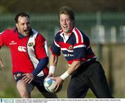 5 january 2004; Munster out-half Ronan O'Gara and centre Mike Mullins in action during squad training. Munster rugby squad training, Thomond Park, Limerick. Picture credit; SPORTSFILE *EDI*