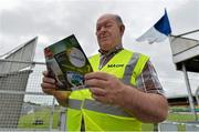 28 June 2013; Steward Willie Mullins, from Carlow, reads his match programme before supporters arrive into the ground. GAA Football All-Ireland Senior Championship, Round 1, Carlow v Laois, Dr. Cullen Park, Carlow. Picture credit: Diarmuid Greene / SPORTSFILE