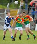 28 June 2013; Tony Bolger, Carlow, in action against Donal Kingston, Laois. GAA Football All-Ireland Senior Championship, Round 1, Carlow v Laois, Dr. Cullen Park, Carlow. Picture credit: Diarmuid Greene / SPORTSFILE