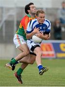 28 June 2013; David Conway, Laois, in action against Benny Kavanagh, Carlow. GAA Football All-Ireland Senior Championship, Round 1, Carlow v Laois, Dr. Cullen Park, Carlow. Picture credit: Diarmuid Greene / SPORTSFILE