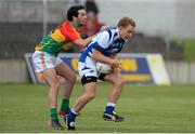 28 June 2013; David Conway, Laois, in action against Benny Kavanagh, Carlow. GAA Football All-Ireland Senior Championship, Round 1, Carlow v Laois, Dr. Cullen Park, Carlow. Picture credit: Diarmuid Greene / SPORTSFILE