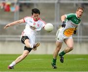 29 June 2013; Matthew Donnelly, Tyrone, in action against Brian Darby, Offaly. GAA Football All-Ireland Senior Championship, Round 1, Offaly v Tyrone, O'Connor Park, Tullamore, Co. Offaly. Picture credit: David Maher / SPORTSFILE