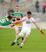 29 June 2013; Conor McAliskey, Tyrone, in action against Eoin Carroll, Offaly. GAA Football All-Ireland Senior Championship, Round 1, Offaly v Tyrone, O'Connor Park, Tullamore, Co. Offaly. Picture credit: David Maher / SPORTSFILE