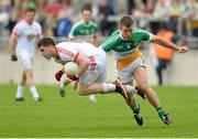 29 June 2013; Conor McAliskey, Tyrone, in action against Alan McNamee, Offaly. GAA Football All-Ireland Senior Championship, Round 1, Offaly v Tyrone, O'Connor Park, Tullamore, Co. Offaly. Picture credit: David Maher / SPORTSFILE
