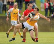 29 June 2013; Paul Doherty, Antrim, in action against Shane Lennon, Louth. GAA Football All-Ireland Senior Championship, Round 1, Louth v Antrim, County Grounds, Drogheda, Co. Louth. Picture credit: Dáire Brennan / SPORTSFILE