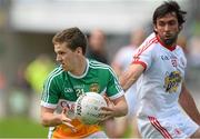 29 June 2013; Ciaran Hurley, Offaly, in action against Joe McMahon, Tyrone. GAA Football All-Ireland Senior Championship, Round 1, Offaly v Tyrone, O'Connor Park, Tullamore, Co. Offaly. Picture credit: David Maher / SPORTSFILE
