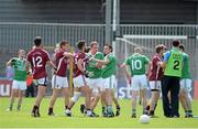 29 June 2013; Fermanagh and Westmeath players tussle during the first half. GAA Football All-Ireland Senior Championship, Round 1, Westmeath v Fermanagh, Cusack Park, Mullingar, Co. Westmeath. Picture credit: Brian Lawless / SPORTSFILE