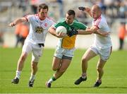 29 June 2013; Ken Casey, Offaly, in action against Conor Gormley, left, and Danny McBride, Tyrone. GAA Football All-Ireland Senior Championship, Round 1, Offaly v Tyrone, O'Connor Park, Tullamore, Co. Offaly. Picture credit: David Maher / SPORTSFILE