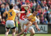 29 June 2013; Adrian Reid, Louth, in action against Justin Crozier, left, and Mark Sweeney, Antrim. GAA Football All-Ireland Senior Championship, Round 1, Louth v Antrim, County Grounds, Drogheda, Co. Louth. Picture credit: Dáire Brennan / SPORTSFILE