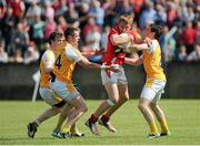 29 June 2013; Ciarán Byrne, Louth, in action against Antrim players, left to right, Justin Crozier, Mark Sweeney, and Kevin O'Boyle. GAA Football All-Ireland Senior Championship, Round 1, Louth v Antrim, County Grounds, Drogheda, Co. Louth. Picture credit: Dáire Brennan / SPORTSFILE