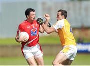 29 June 2013; Brian White, Louth, in action against Richard Johnson, Antrim. GAA Football All-Ireland Senior Championship, Round 1, Louth v Antrim, County Grounds, Drogheda, Co. Louth. Picture credit: Dáire Brennan / SPORTSFILE