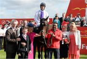 29 June 2013; The winning connections of Trading Leather, including, from left to right, Jim Bolger, James Manning, Jackie Bolger, jockey Kevin Manning, groom Mohammed Abid Ghaffour, Una Manning and Claire Manning after winning the Dubai Duty Free Irish Derby. Curragh Racecourse, The Curragh, Co. Kildare. Picture credit: Diarmuid Greene / SPORTSFILE