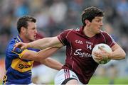 29 June 2013; Michael Meehan, Galway, in action against Paddy Codd, Tipperary. GAA Football All-Ireland Senior Championship, Round 1, Galway v Tipperary, Pearse Stadium, Galway. Picture credit: Ray Ryan / SPORTSFILE