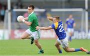 29 June 2013; Pa Ranahan, Limerick, in action against Shane Doyle, Longford. GAA Football All Ireland Senior Championship, Round 1, Longford v Limerick, Pearse Park, Longford. Picture credit: Ray Lohan / SPORTSFILE
