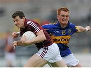 29 June 2013; Keith Kelly, Galway, in action against George Hannigan, Tipperary. GAA Football All-Ireland Senior Championship, Round 1, Galway v Tipperary, Pearse Stadium, Galway. Picture credit: Ray Ryan / SPORTSFILE