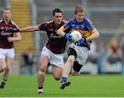 29 June 2013; Brian Fox, Tipperary, in action against Michael Farragher, Galway. GAA Football All-Ireland Senior Championship, Round 1, Galway v Tipperary, Pearse Stadium, Galway. Picture credit: Ray Ryan / SPORTSFILE