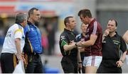 29 June 2013; Tipperary manager Peter Creedon watches as the linesman tries settle Paul Conroy, Galway. GAA Football All-Ireland Senior Championship, Round 1, Galway v Tipperary, Pearse Stadium, Galway. Picture credit: Ray Ryan / SPORTSFILE