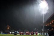21 February 2020; Players from both sides walk out as heavy rain falls ahead of the SSE Airtricity League Premier Division match between Sligo Rovers and St. Patrick's Athletic at The Showgrounds in Sligo. Photo by Ben McShane/Sportsfile