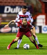 21 February 2020; Karl Sheppard of Shelbourne in action against Jordan Flores of Dundalk during the SSE Airtricity League Premier Division match between Shelbourne and Dundalk at Tolka Park in Dublin. Photo by Eóin Noonan/Sportsfile
