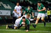 21 February 2020; Hayden Hyde of Ireland scores his side's second try despite the tackle of Connor Doherty of England during the Six Nations U20 Rugby Championship match between England and Ireland at Franklin’s Gardens in Northampton, England. Photo by Brendan Moran/Sportsfile